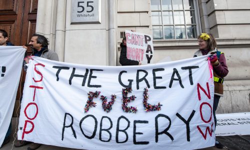 D3D4N1 A protest organised by Fuel Poverty Action outside the  Department of Energy and Climate Change as part of a national weekend of fuel bill actions. A mixed group of pensioners, disabled groups and activists trying to reduce poverty gathered under the  ?Stop the Great Fuel Robbery? slogan and were complaining against ever increasing fuel bills.  Whitehall, London, UK 16 February 2013.